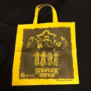 Toss your things in the Upside Down of a STRANGER THINGS Collectible Tote Bag!